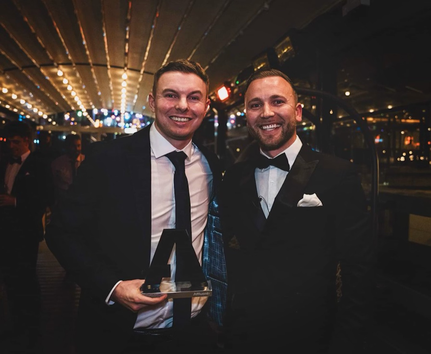 Attain Digital collecting an industry award